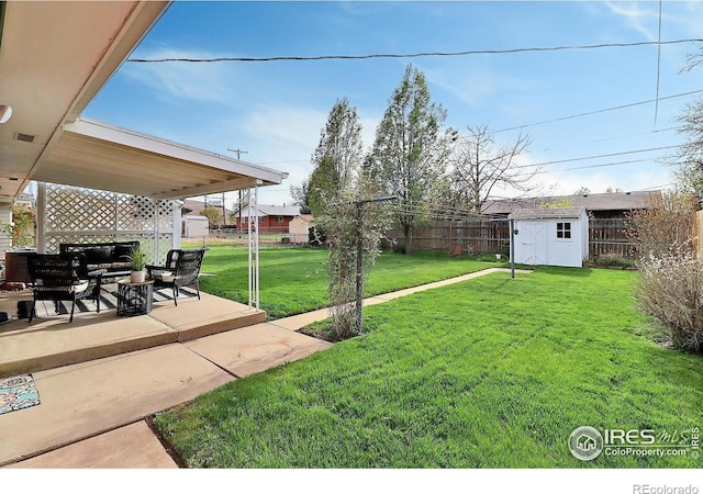 821 36th Ave, Greeley, CO 80634 - view of yard with a patio, an outdoor hangout area, a storage shed, and an outbuilding