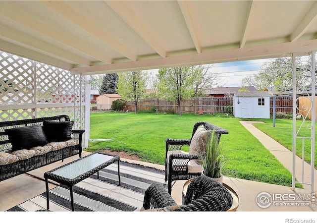 821 36th Ave, Greeley, CO 80634 - view of patio / terrace with a storage unit, an outdoor structure, and outdoor lounge area