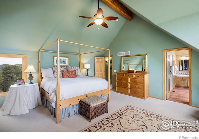 187 Rocky Knob Ln, Nederland, CO 80466 - bedroom featuring visible vents, high vaulted ceiling, beamed ceiling, carpet flooring, and ensuite bath