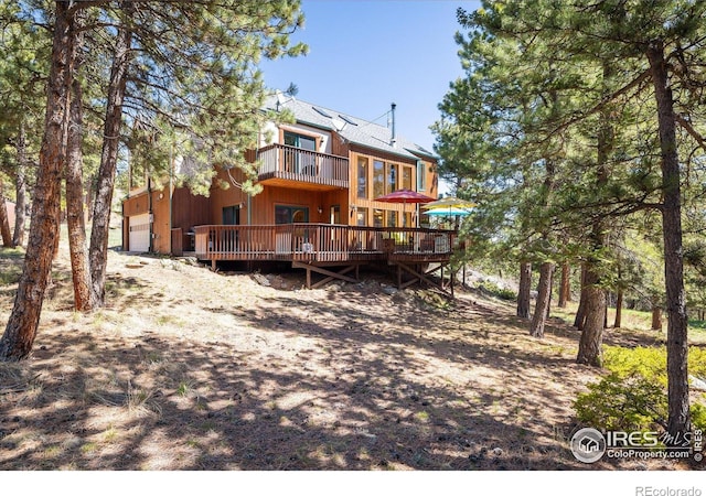 187 Rocky Knob Ln, Nederland, CO 80466 - rear view of property featuring a deck and a balcony