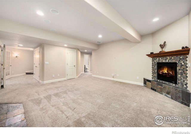1105 Shelby Dr, Berthoud, CO 80513 - unfurnished living room with a fireplace, carpet floors, recessed lighting, and baseboards