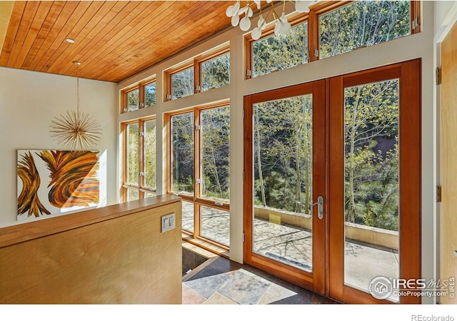 1127 Valley Ln, Boulder, CO 80302 - doorway to outside featuring wooden ceiling