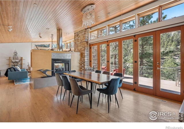 1127 Valley Ln, Boulder, CO 80302 - dining space featuring visible vents, wooden ceiling, french doors, and a healthy amount of sunlight