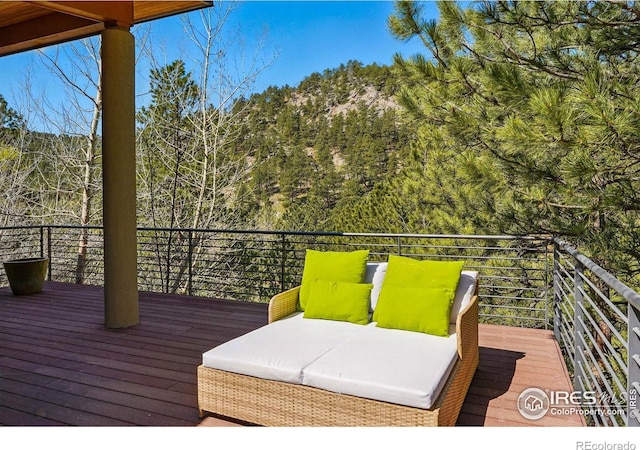 1127 Valley Ln, Boulder, CO 80302 - deck featuring a wooded view