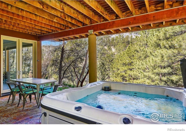 1127 Valley Ln, Boulder, CO 80302 - exterior space with a hot tub, french doors, and outdoor dining space