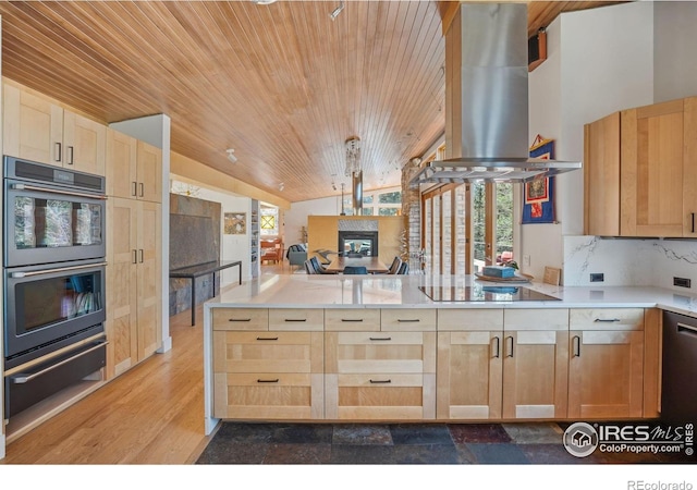 1127 Valley Ln, Boulder, CO 80302 - kitchen featuring light brown cabinetry, island range hood, wood ceiling, double wall oven, and a warming drawer