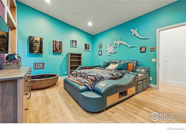 1127 Valley Ln, Boulder, CO 80302 - bedroom with recessed lighting, baseboards, vaulted ceiling, and wood finished floors