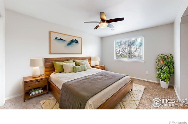 2330 Redwood Ave, Lafayette, CO 80026 - bedroom with baseboards, light carpet, and ceiling fan