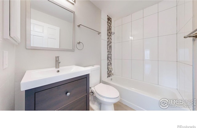 2330 Redwood Ave, Lafayette, CO 80026 - full bathroom with toilet, shower / tub combination, and vanity