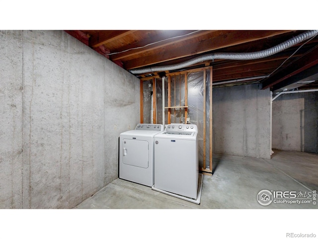 laundry area featuring laundry area and washing machine and dryer