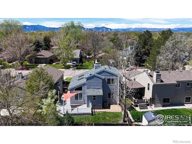 birds eye view of property featuring a residential view and a mountain view