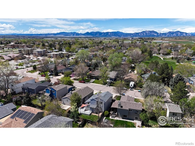 drone / aerial view with a mountain view and a residential view