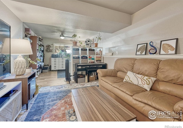 150 Lori Dr, Loveland, CO 80537 - living area featuring a ceiling fan and wood finished floors