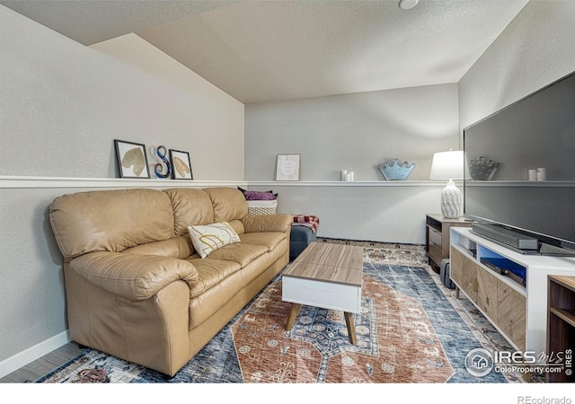 150 Lori Dr, Loveland, CO 80537 - living area featuring a textured ceiling