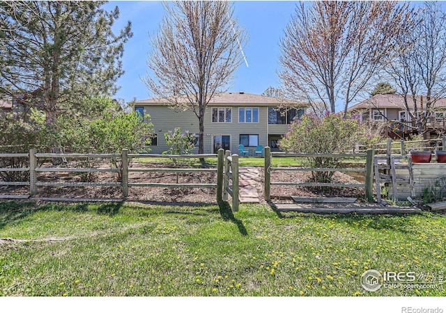 exterior space with a gate and fence