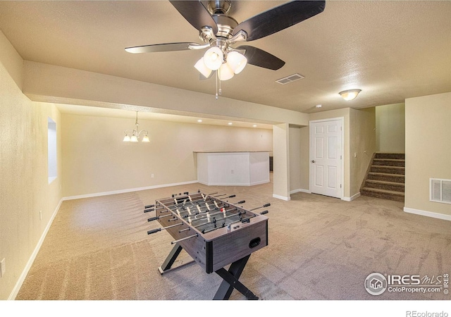 1693 Maseca Plaza Way, Severance, CO 80550 - game room with carpet flooring, a ceiling fan, baseboards, a chandelier, and a textured ceiling