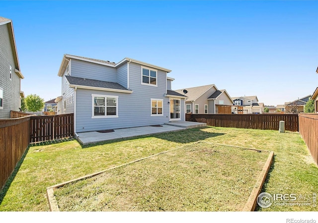 1693 Maseca Plaza Way, Severance, CO 80550 - rear view of property with a patio