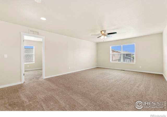 1693 Maseca Plaza Way, Severance, CO 80550 - unfurnished room with carpet flooring, a ceiling fan, baseboards, and recessed lighting