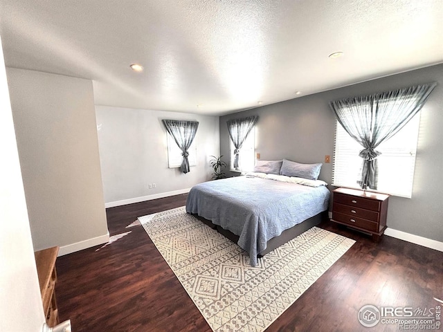 1600 Dogwood Ct, Fort Collins, CO 80525 - bedroom with baseboards, a textured ceiling, recessed lighting, and wood finished floors