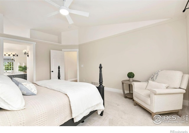 bedroom featuring a ceiling fan, visible vents, light colored carpet, vaulted ceiling, and baseboards
