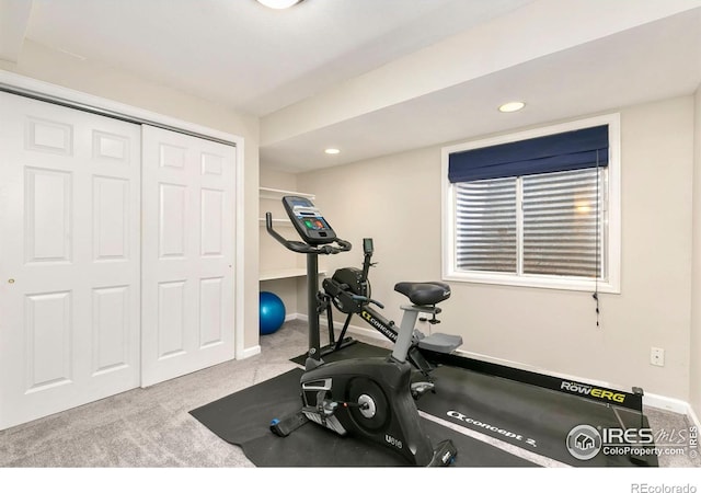 workout room with recessed lighting, baseboards, and carpet