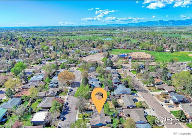 aerial view featuring a mountain view and a residential view