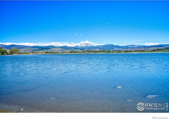 property view of water featuring a mountain view