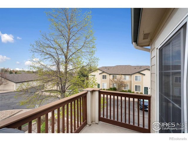 balcony featuring a residential view