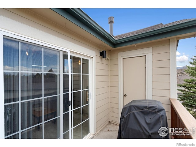 exterior space with a grill