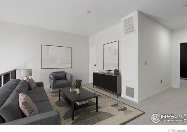 1200 Yarmouth Ave Unit 238, Boulder, CO 80304 - living room with baseboards, light carpet, and visible vents