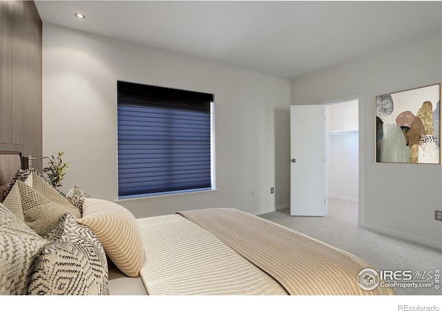 1200 Yarmouth Ave Unit 238, Boulder, CO 80304 - carpeted bedroom featuring recessed lighting, baseboards, and a walk in closet