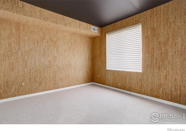 1200 Yarmouth Ave Unit 238, Boulder, CO 80304 - carpeted empty room with baseboards, visible vents, and wallpapered walls