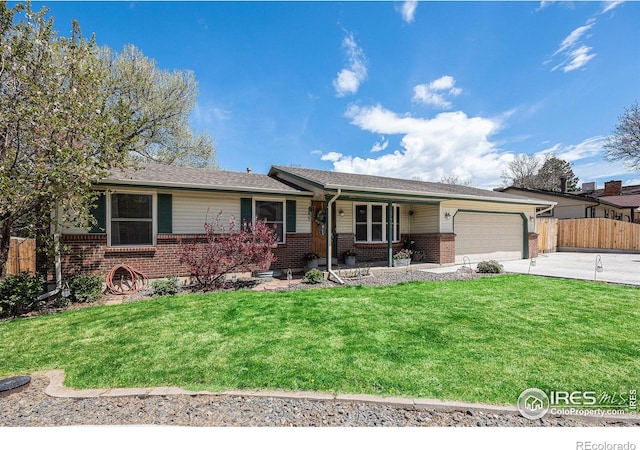 7960 Estes Ct, Arvada, CO 80005 - ranch-style house featuring a garage, fence, a front yard, brick siding, and concrete driveway