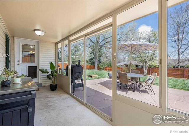 7960 Estes Ct, Arvada, CO 80005 - doorway to outside with a wealth of natural light