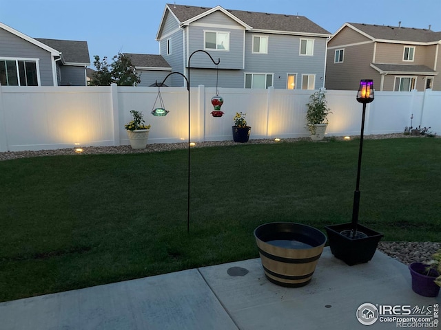 view of yard featuring a fenced backyard