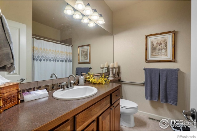 6836 Spanish Bay Dr, Windsor, CO 80550 - full bathroom with tile patterned flooring, vanity, toilet, decorative backsplash, and curtained shower