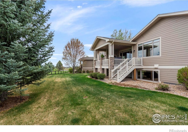 6836 Spanish Bay Dr, Windsor, CO 80550 - view of yard with stairway