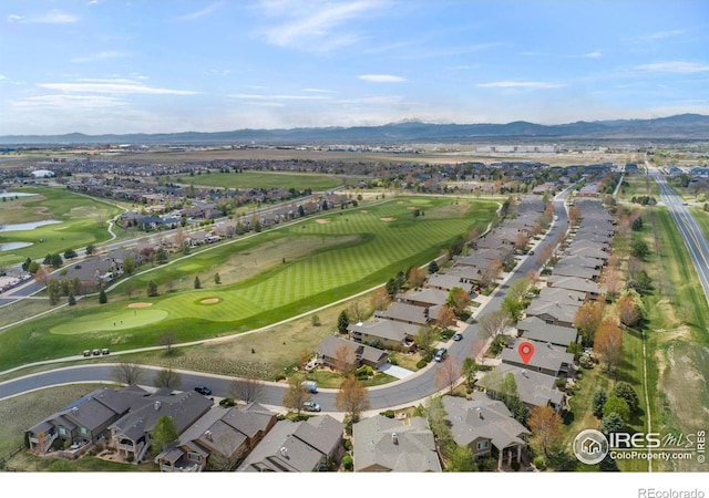 6836 Spanish Bay Dr, Windsor, CO 80550 - birds eye view of property featuring a residential view, view of golf course, and a water and mountain view