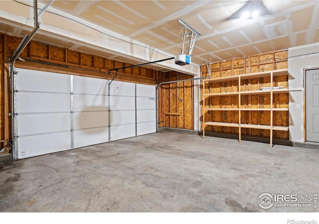 garage featuring a garage door opener