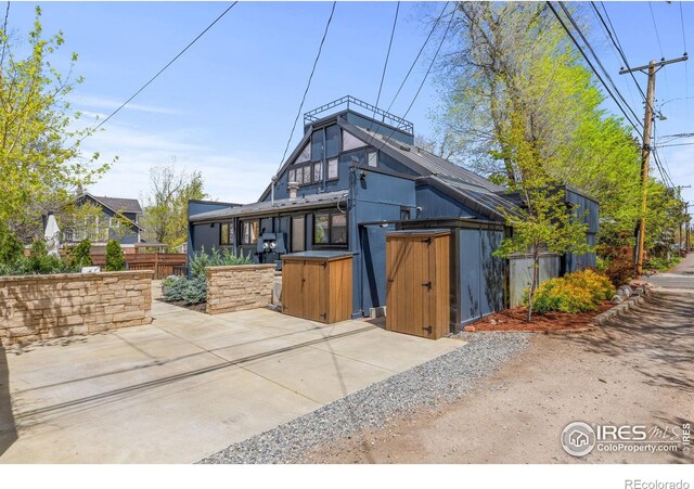 exterior space with a patio and fence