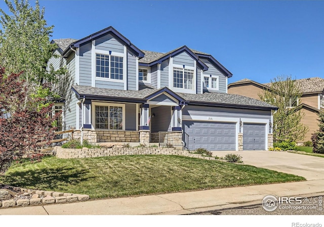910 Pope Dr, Erie, CO 80516 - craftsman house with a porch, driveway, roof with shingles, a front yard, and stone siding