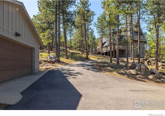 view of road featuring driveway