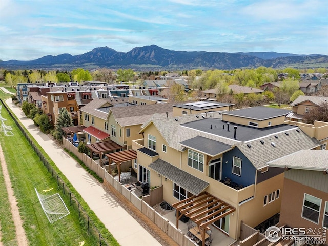 birds eye view of property featuring a residential view and a mountain view