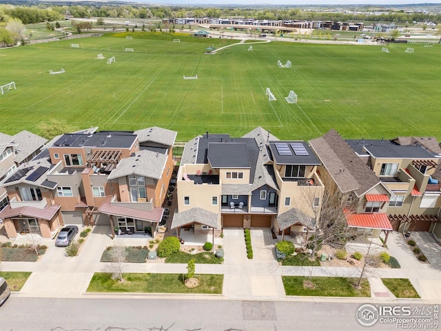birds eye view of property with a residential view