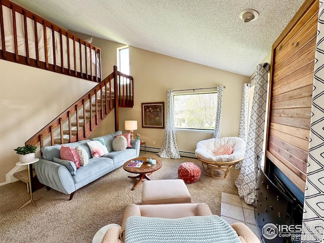living area featuring carpet floors, a textured ceiling, and a healthy amount of sunlight