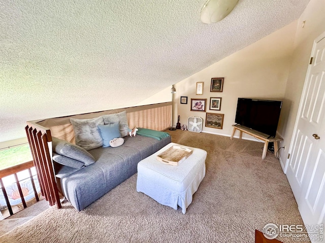 living area with carpet flooring, a textured ceiling, and lofted ceiling