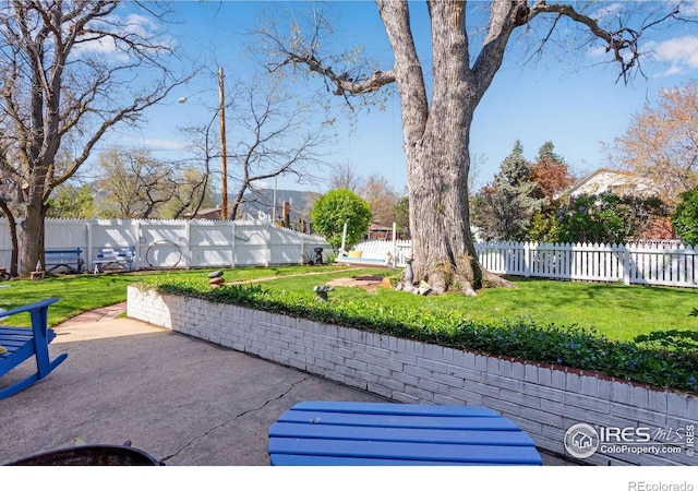 view of patio with a fenced backyard