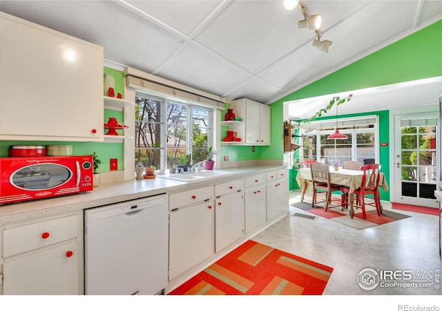 kitchen featuring white dishwasher, open shelves, a sink, white cabinetry, and vaulted ceiling