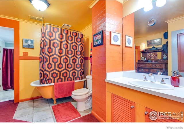 bathroom featuring toilet, visible vents, ornamental molding, and vanity