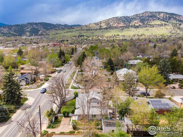 drone / aerial view with a residential view and a mountain view